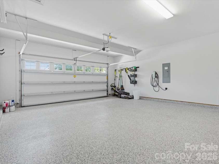 5353 Baker Lane, Clover, SC 29710.  MLS# CAR4401671, YatesRealty ID 39994. Garage featuring professional-grade epoxy flooring.