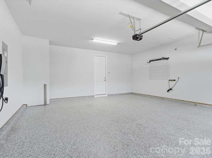 5353 Baker Lane, Clover, SC 29710.  MLS# CAR4401671, YatesRealty ID 39994. Garage featuring professional-grade epoxy flooring.