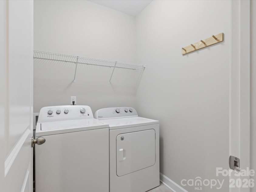 5353 Baker Lane, Clover, SC 29710.  MLS# CAR4401671, YatesRealty ID 39994. Large laundry room on main level.