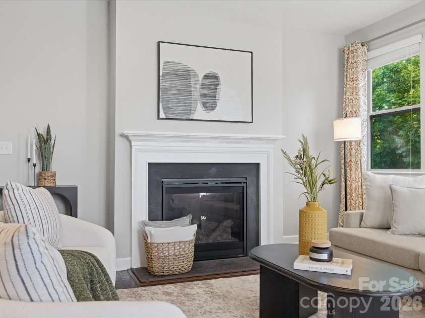 5353 Baker Lane, Clover, SC 29710.  MLS# CAR4401671, YatesRealty ID 39994. Living room featuring a gas fireplace.