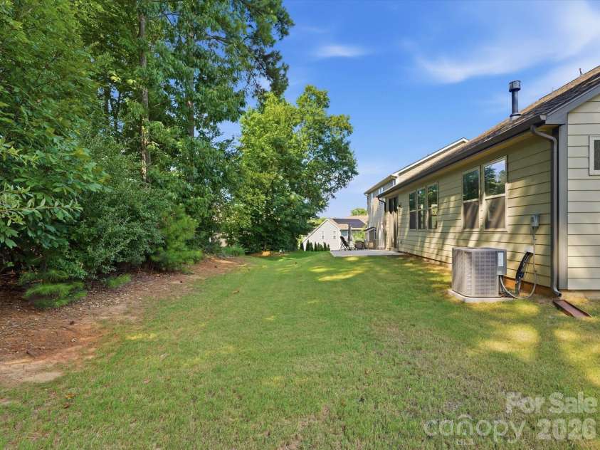 5353 Baker Lane, Clover, SC 29710.  MLS# CAR4401671, YatesRealty ID 39994. Private backyard backs up to wooded area.