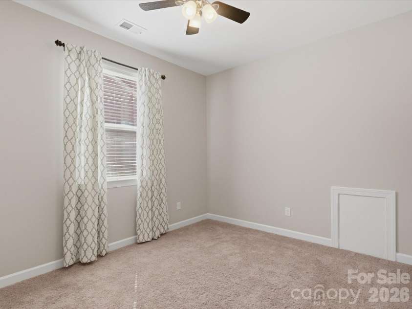 5353 Baker Lane, Clover, SC 29710.  MLS# CAR4401671, YatesRealty ID 39994. Spacious second bedroom.