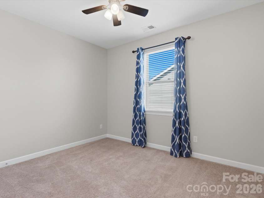 5353 Baker Lane, Clover, SC 29710.  MLS# CAR4401671, YatesRealty ID 39994. Third bedroom, located on the upper level.
