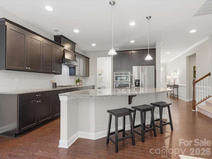 5353 Baker Lane, Clover, SC 29710.  MLS# CAR4401671, YatesRealty ID 39994. This large, chef-grade kitchen offers an open-concept design that is ideal for both gourmet meal preparation and hosting guests.