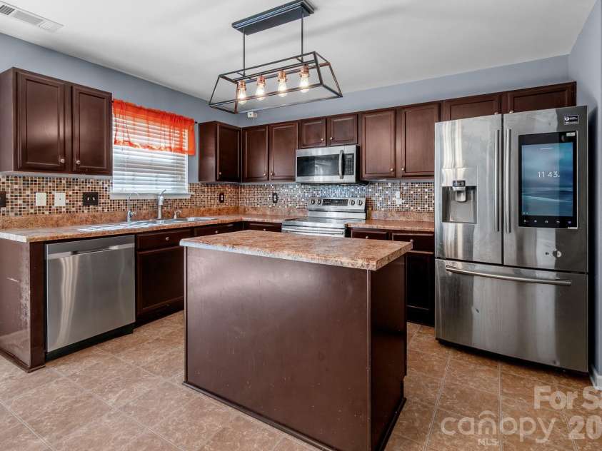 9520 Eagle Feathers Drive, Charlotte, NC 28214.  MLS# CAR4357175, YatesRealty ID 4000. 