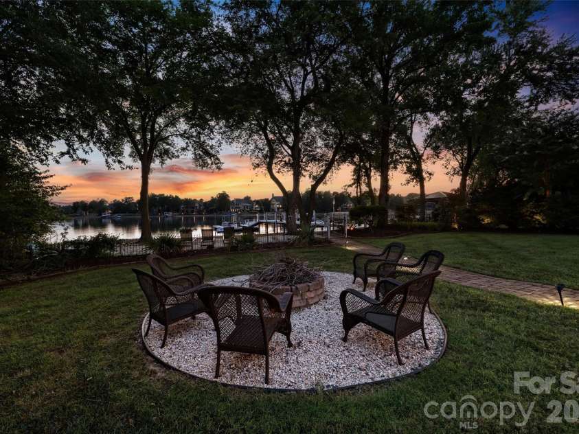 119 Sterling Oak Lane, Mooresville, NC 28117.  MLS# CAR4405629, YatesRealty ID 40003. Back Yard Firepit at Sunset
