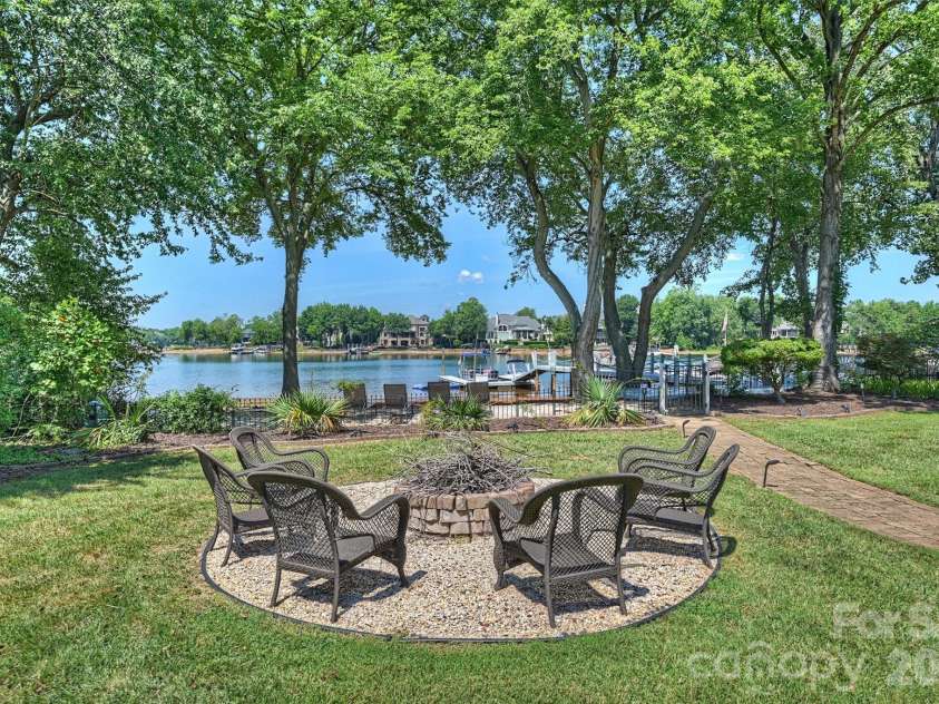 119 Sterling Oak Lane, Mooresville, NC 28117.  MLS# CAR4405629, YatesRealty ID 40003. Back Yard with Fire Pit