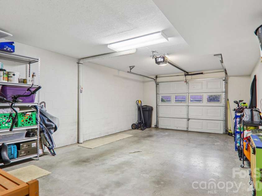 3311 Sandy Drive, Hendersonville, NC 28792.  MLS# CAR4406829, YatesRealty ID 40014. Attached garage