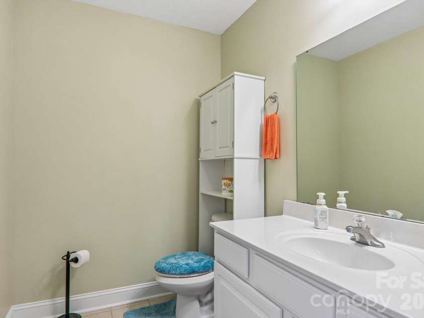 3311 Sandy Drive, Hendersonville, NC 28792.  MLS# CAR4406829, YatesRealty ID 40014. Convenient lower level bath