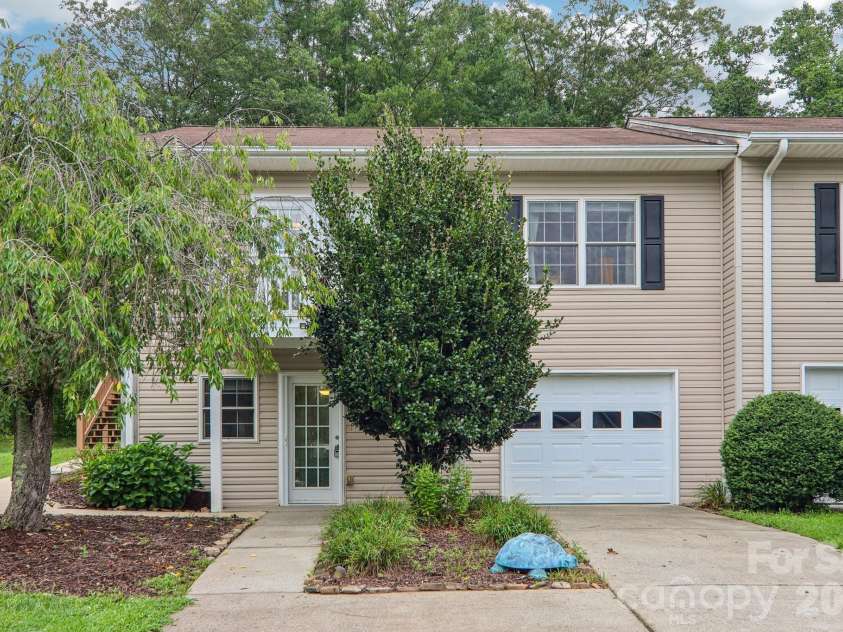 3311 Sandy Drive, Hendersonville, NC 28792.  MLS# CAR4406829, YatesRealty ID 40014. Desirable end unit with garage