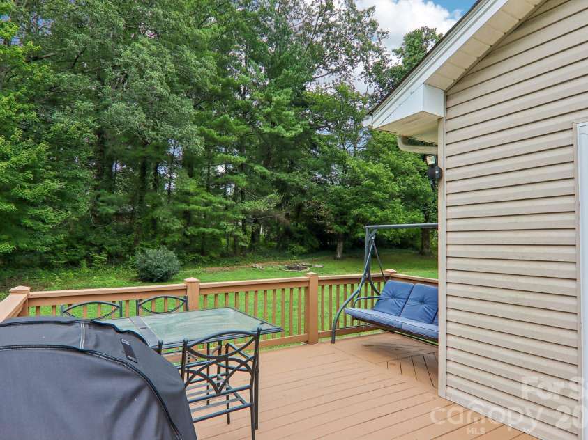 3311 Sandy Drive, Hendersonville, NC 28792.  MLS# CAR4406829, YatesRealty ID 40014. Great deck for entertaining