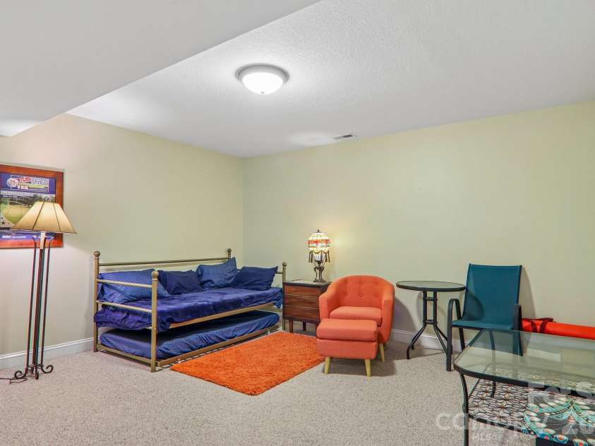 3311 Sandy Drive, Hendersonville, NC 28792.  MLS# CAR4406829, YatesRealty ID 40014. Lower level office area