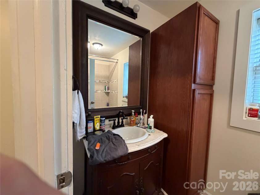 77 Maple Road, Spruce Pine, NC 28777.  MLS# CAR4407771, YatesRealty ID 40015. Bath