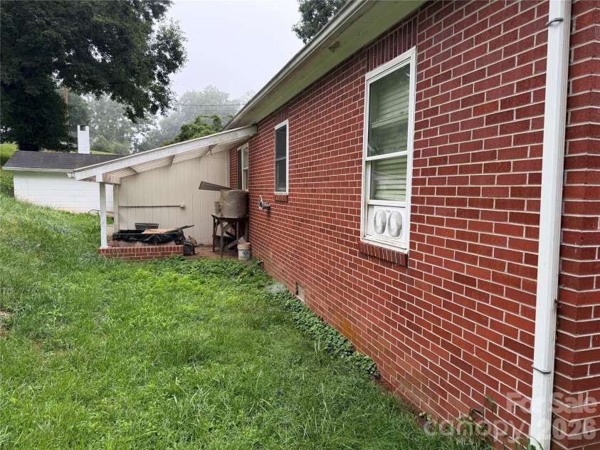 77 Maple Road, Spruce Pine, NC 28777.  MLS# CAR4407771, YatesRealty ID 40015. Rear