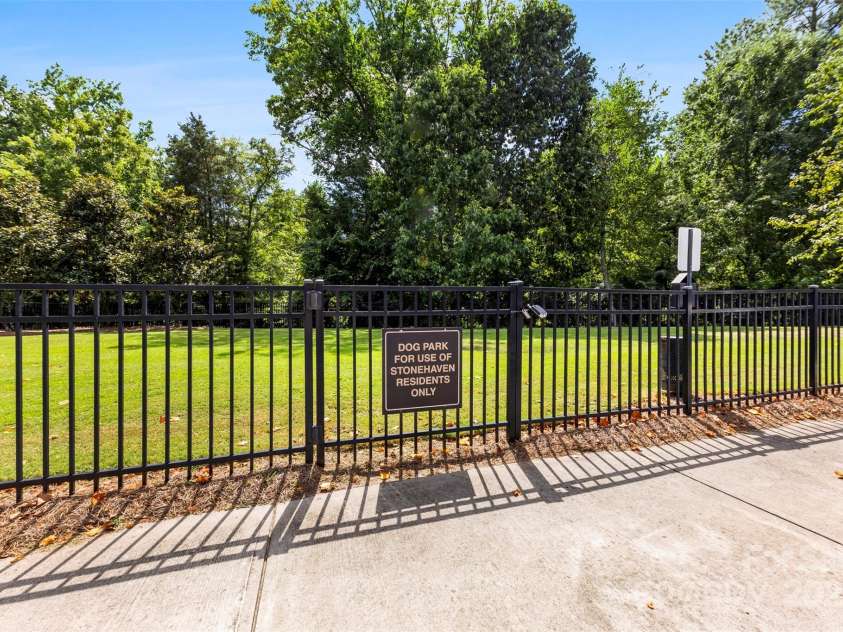 7223 Lochy Lane, Charlotte, NC 28278.  MLS# CAR4298541, YatesRealty ID 40020. Many pet owners in the area enjoy the dog park in easy walking distance to the townhome!