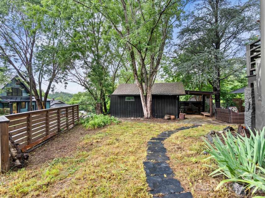 35 Northview Street, Asheville, NC 28801.  MLS# CAR4402635, YatesRealty ID 40027. Path Leads to Backyard and Accessory Structures