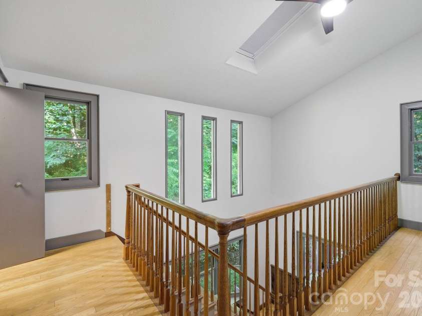 222 Morgan Cove Road, Candler, NC 28715.  MLS# CAR4403982, YatesRealty ID 40029. 2nd Level Landing/Walkway