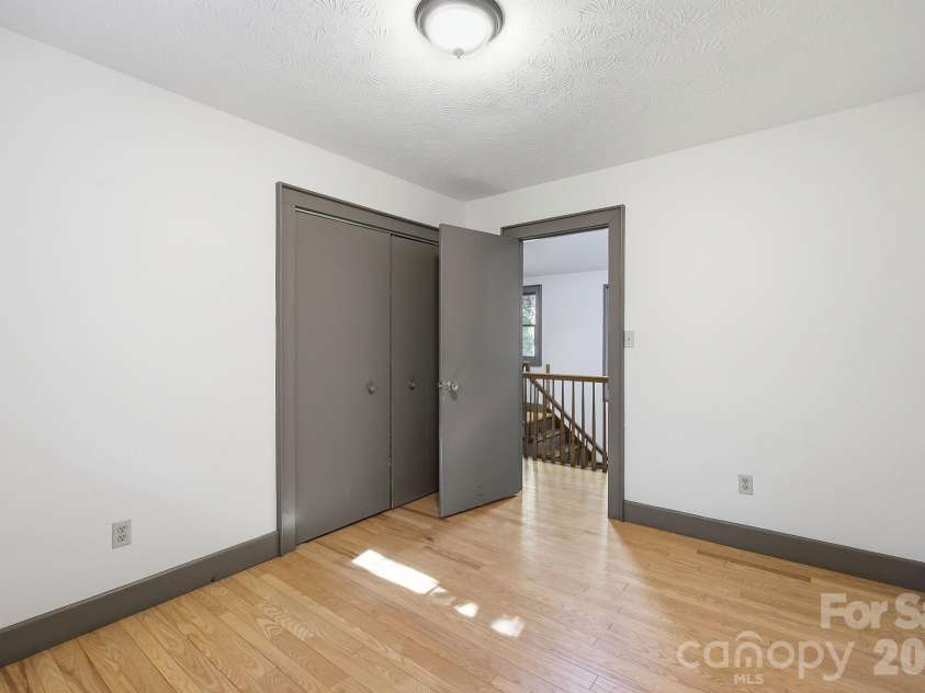 222 Morgan Cove Road, Candler, NC 28715.  MLS# CAR4403982, YatesRealty ID 40029. 3rd Bedroom