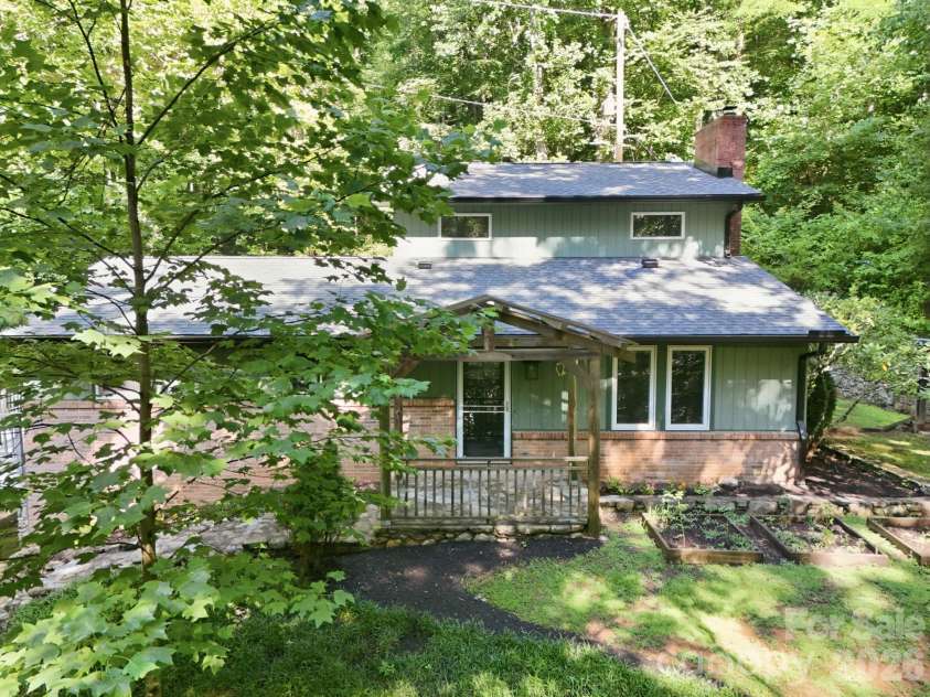 222 Morgan Cove Road, Candler, NC 28715.  MLS# CAR4403982, YatesRealty ID 40029. 
