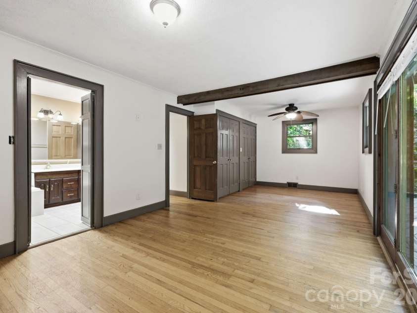 222 Morgan Cove Road, Candler, NC 28715.  MLS# CAR4403982, YatesRealty ID 40029. Primary Bedroom