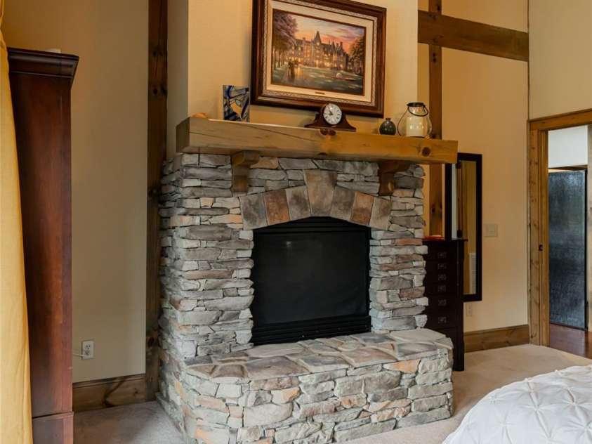 649 Panoramic Loop, Maggie Valley, NC 28751.  MLS# CAR4360546, YatesRealty ID 40031. Double-sided fireplace