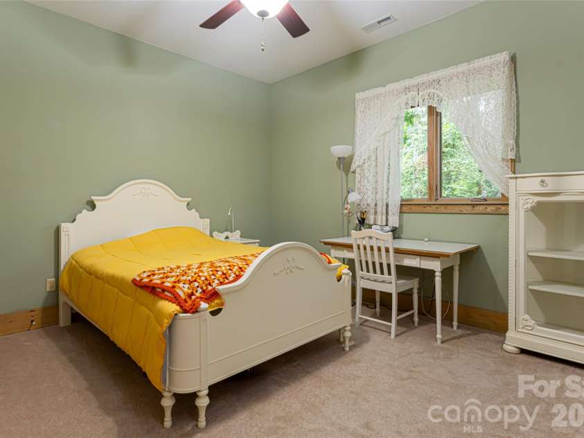 649 Panoramic Loop, Maggie Valley, NC 28751.  MLS# CAR4360546, YatesRealty ID 40031. Lower bedroom