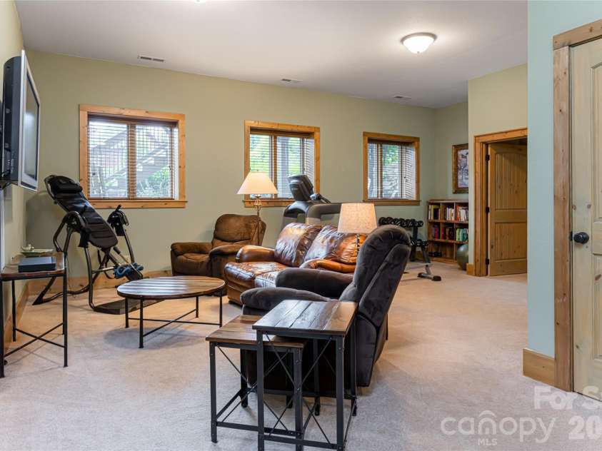 649 Panoramic Loop, Maggie Valley, NC 28751.  MLS# CAR4360546, YatesRealty ID 40031. Lower family room
