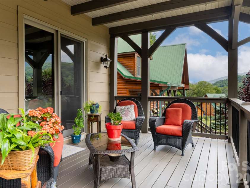649 Panoramic Loop, Maggie Valley, NC 28751.  MLS# CAR4360546, YatesRealty ID 40031. Main level deck