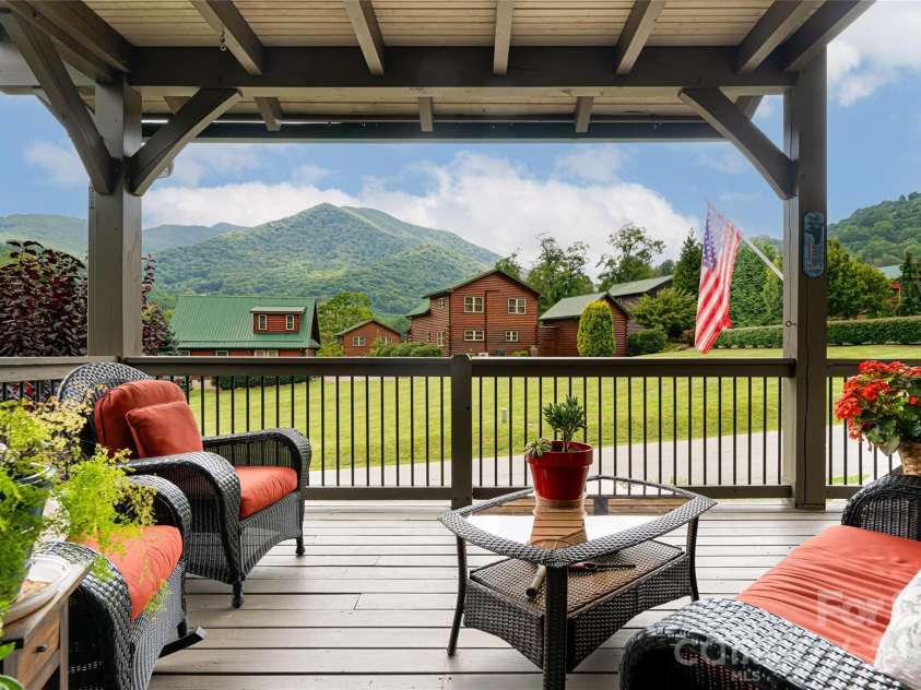 649 Panoramic Loop, Maggie Valley, NC 28751.  MLS# CAR4360546, YatesRealty ID 40031. Main level deck off primary