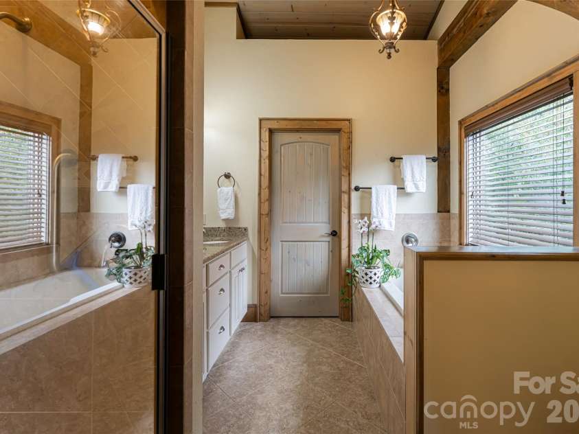 649 Panoramic Loop, Maggie Valley, NC 28751.  MLS# CAR4360546, YatesRealty ID 40031. Primary ensuite