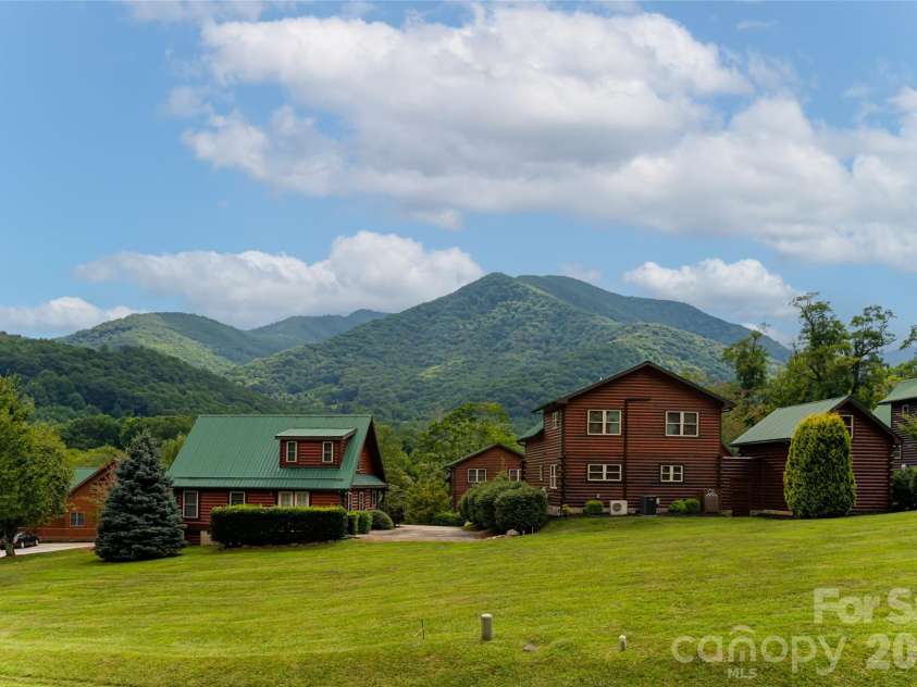 649 Panoramic Loop, Maggie Valley, NC 28751.  MLS# CAR4360546, YatesRealty ID 40031. Views from front porch