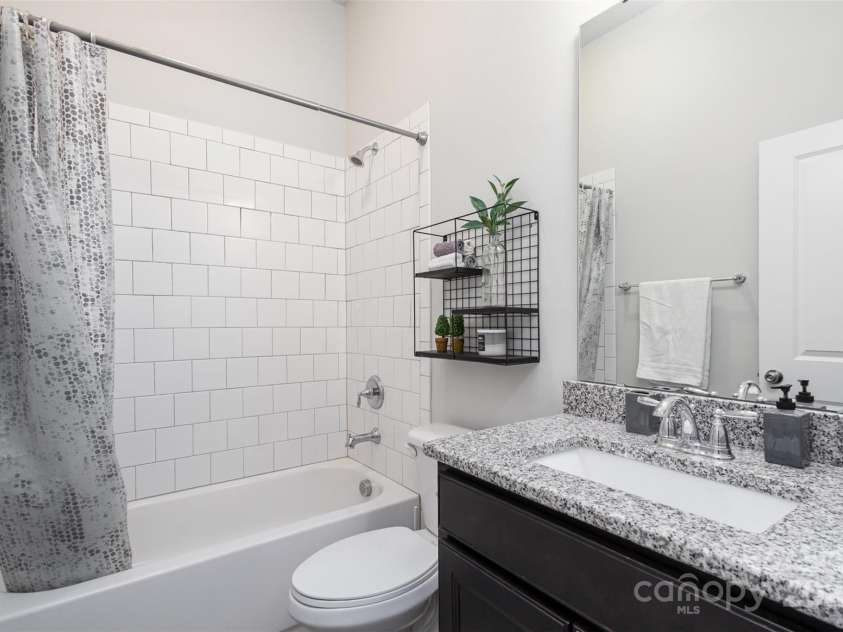 234 Iverson Way, Charlotte, NC 28203.  MLS# CAR4227452, YatesRealty ID 4004. Ensuite second bedroom bathroom