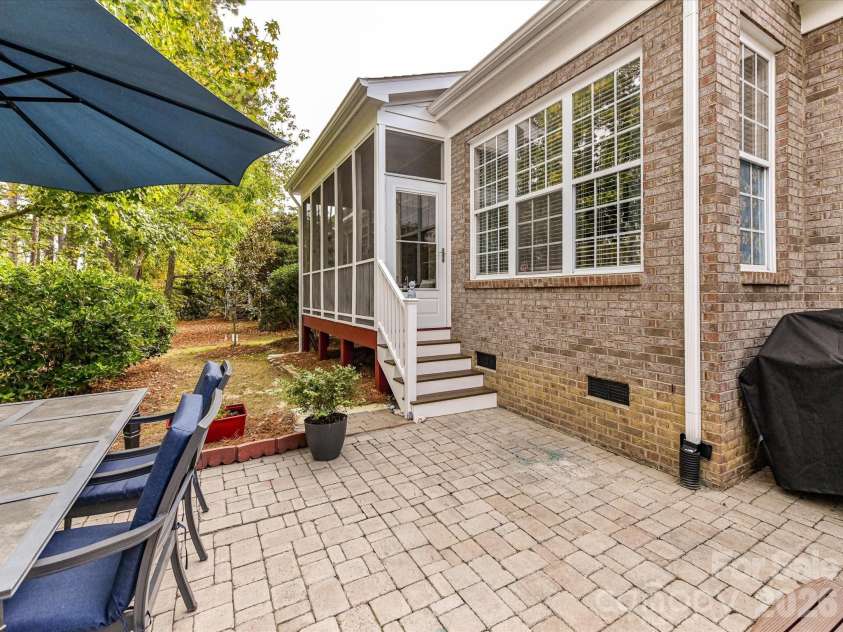 3619 Savannah Hills Drive, Matthews, NC 28105.  MLS# CAR4325650, YatesRealty ID 4004. Extended Back Brick Patio