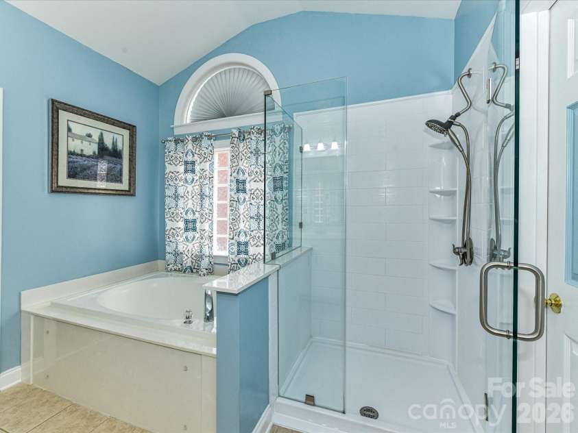 3619 Savannah Hills Drive, Matthews, NC 28105.  MLS# CAR4325650, YatesRealty ID 4004. Primary Bathroom with Soaking Garden Tub &  Separate Shower
