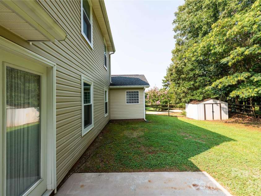 266 Kendra Drive, Concord, NC 28025.  MLS# CAR4401162, YatesRealty ID 40046. Back patio