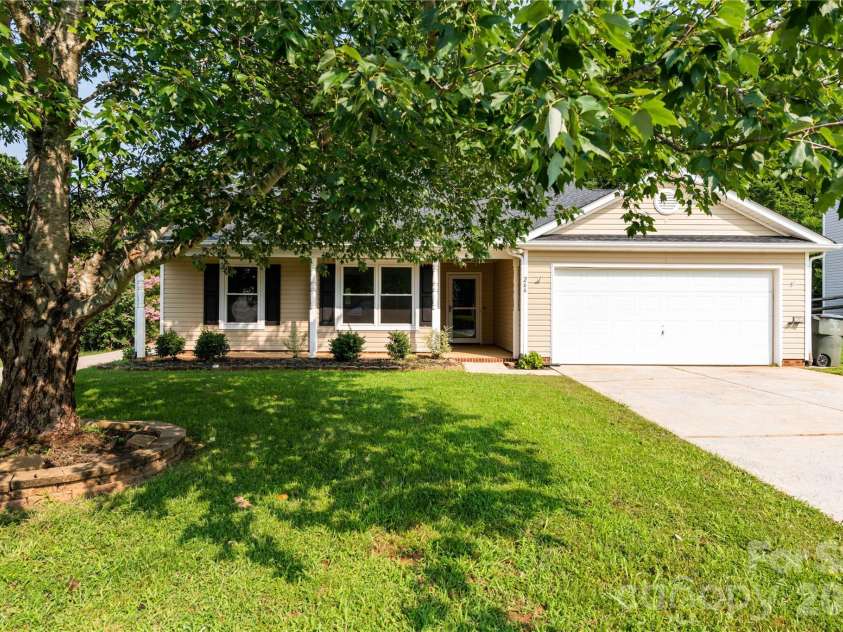 266 Kendra Drive, Concord, NC 28025.  MLS# CAR4401162, YatesRealty ID 40046. Mature front yard with shaded views