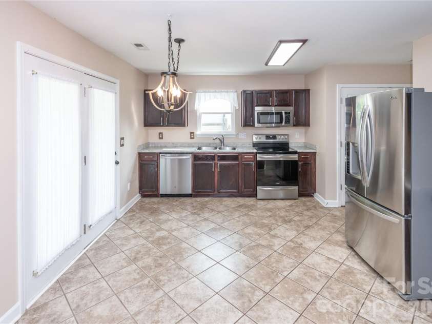 266 Kendra Drive, Concord, NC 28025.  MLS# CAR4401162, YatesRealty ID 40046. Spacious kitchen with eat-in area