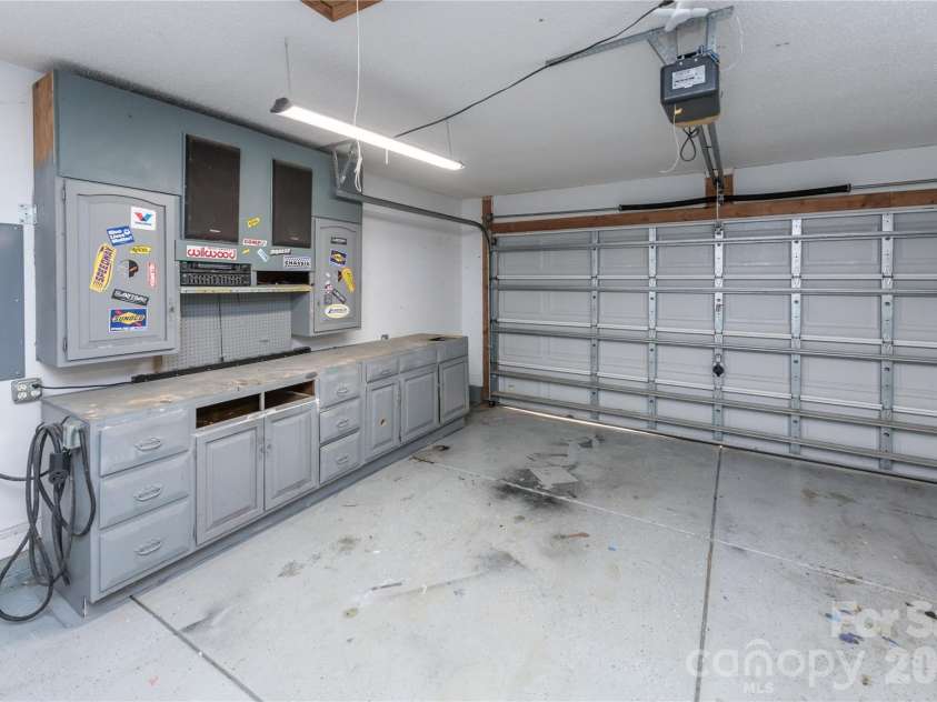 266 Kendra Drive, Concord, NC 28025.  MLS# CAR4401162, YatesRealty ID 40046. Tinkerers and mechanics, this is your dream setup!