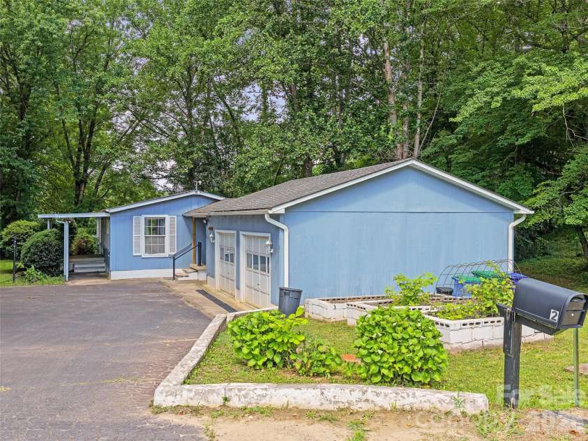 2 Lost Forest Drive, Candler, NC 28715.  MLS# CAR4402355, YatesRealty ID 40053. 