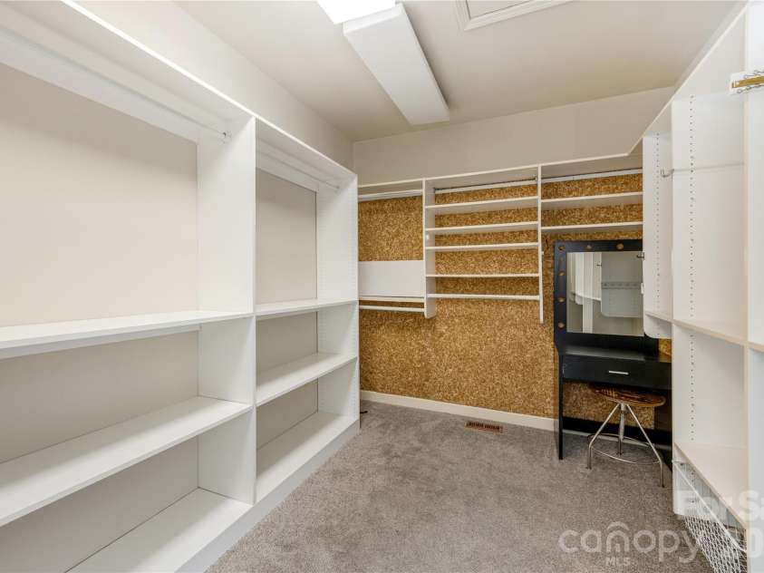 20 Inglewood Road, Asheville, NC 28804.  MLS# CAR4392997, YatesRealty ID 40056. Primary closet with built-ins