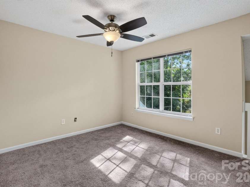 8318 Christmas Court, Charlotte, NC 28216.  MLS# CAR4407255, YatesRealty ID 40061. Loft Upper level