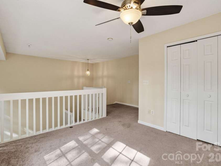 8318 Christmas Court, Charlotte, NC 28216.  MLS# CAR4407255, YatesRealty ID 40061. Loft Upper level