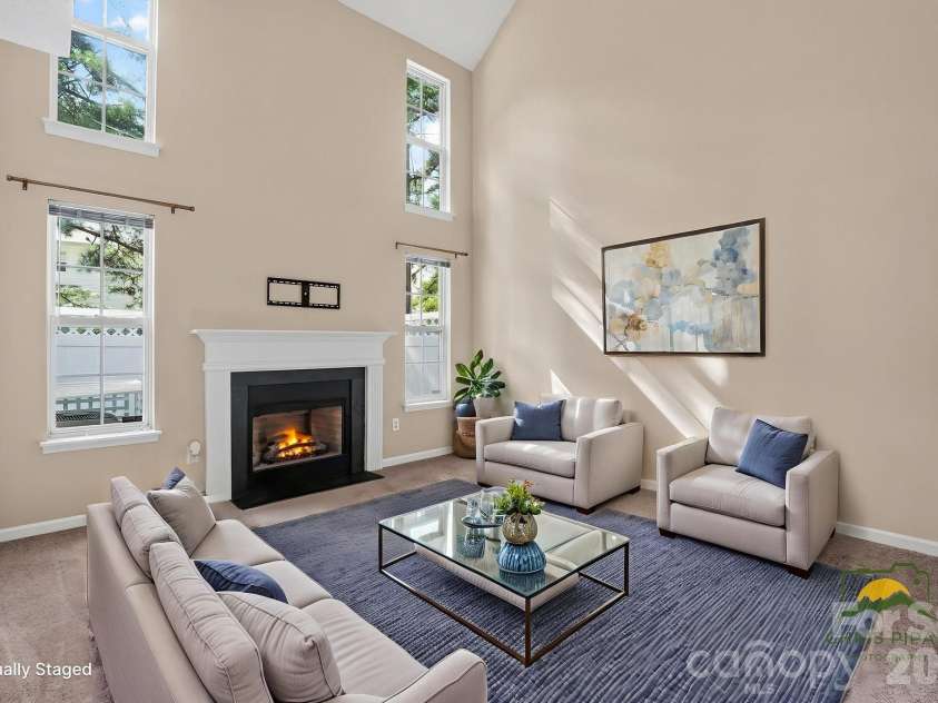 8318 Christmas Court, Charlotte, NC 28216.  MLS# CAR4407255, YatesRealty ID 40061. Virtually staged Great room