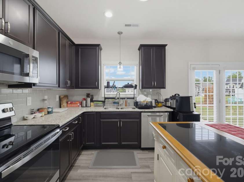 668 Palomino Mustang Drive, Whitsett, NC 27377.  MLS# CAR4407147, YatesRealty ID 40065. 