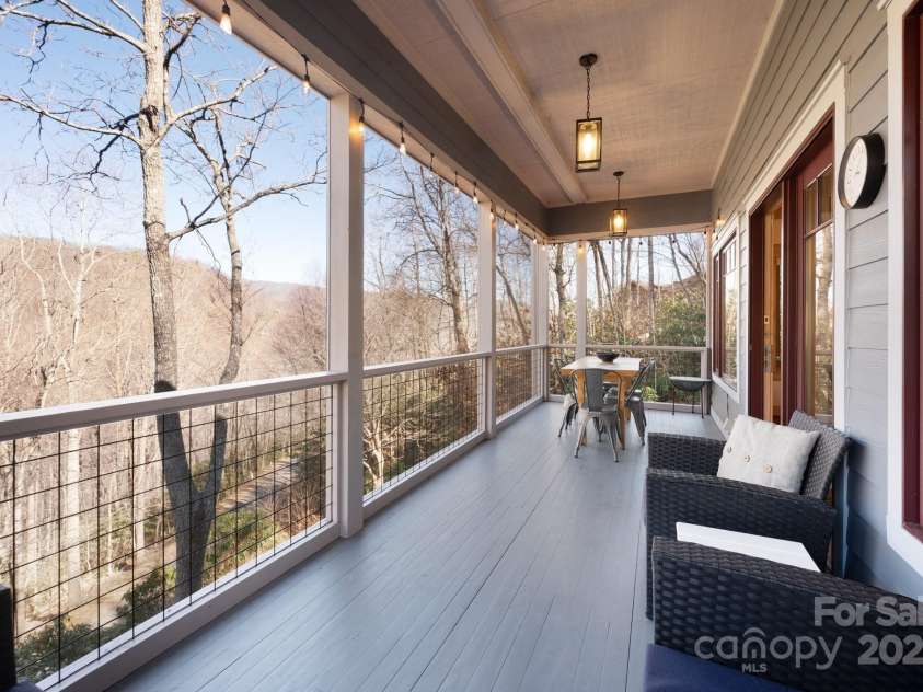 18 Wood Haven Lane, Black Mountain, NC 28711.  MLS# CAR4228903, YatesRealty ID 4007. Lovely Screened-In Deck 