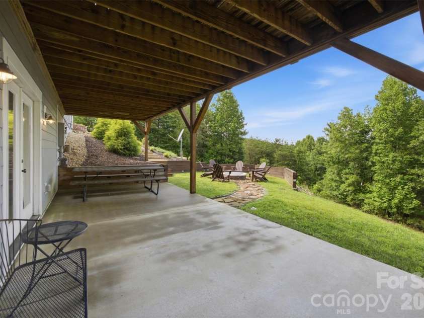 47 Pleasant Ridge Trail, Nebo, NC 28761.  MLS# CAR4405959, YatesRealty ID 40073. Concrete Patio from Basement