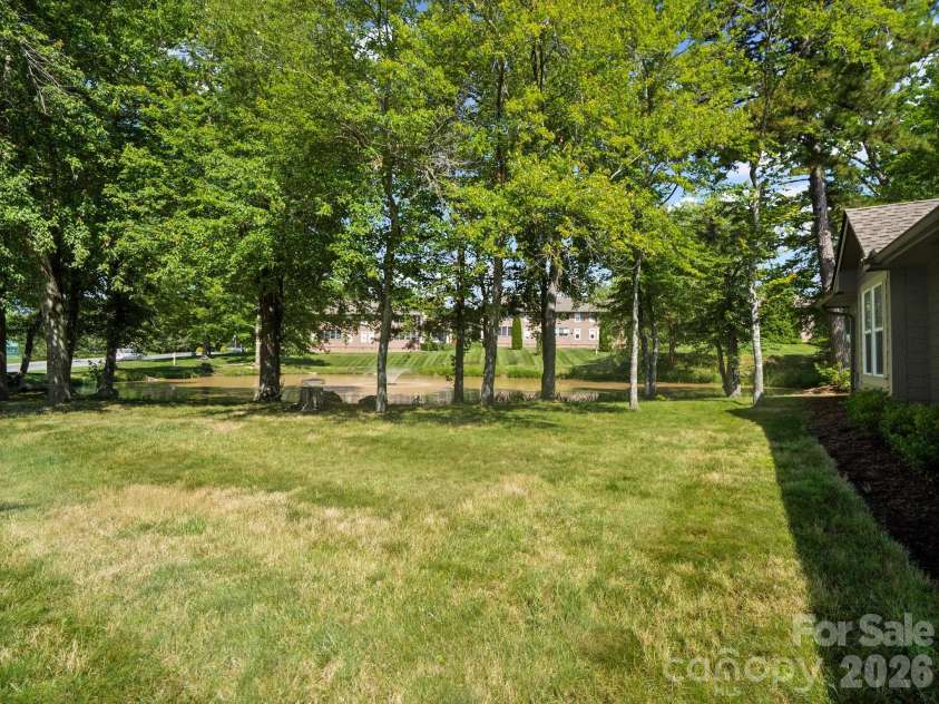 10 Gray Wolf Lane, Hendersonville, NC 28792.  MLS# CAR4267115, YatesRealty ID 4009. Bordered by Pond and Large Open Greenway