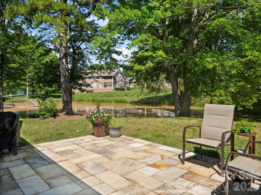 10 Gray Wolf Lane, Hendersonville, NC 28792.  MLS# CAR4267115, YatesRealty ID 4009. Pond View From Back Patio