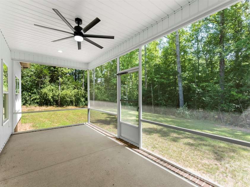 5005 Oconee Drive, Stanley, NC 28164.  MLS# CAR4402337, YatesRealty ID 40096. Overlooking wooded backdrop
