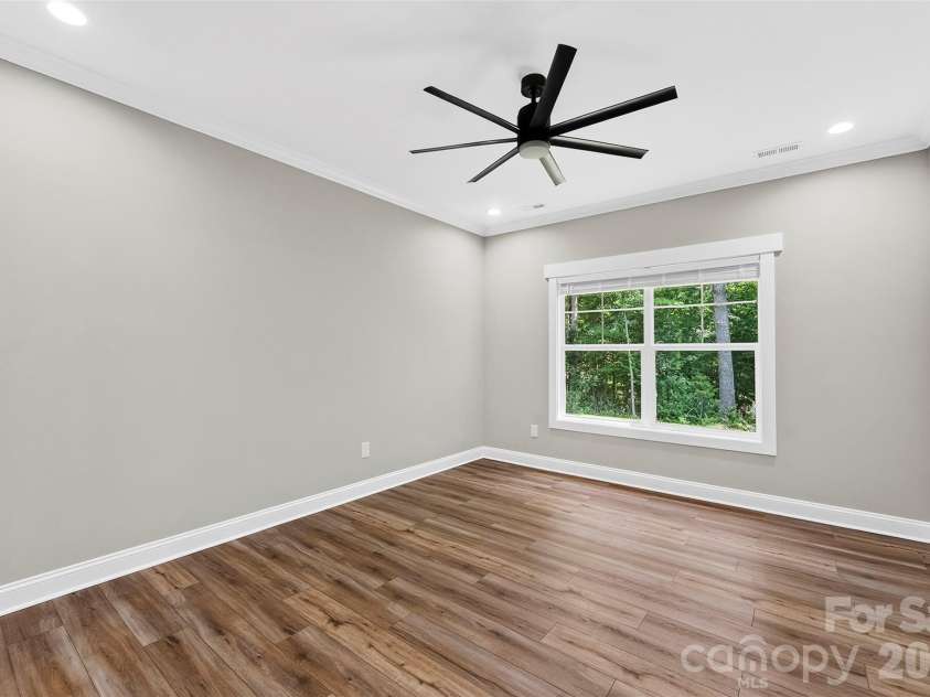 5005 Oconee Drive, Stanley, NC 28164.  MLS# CAR4402337, YatesRealty ID 40096. Primary bedroom